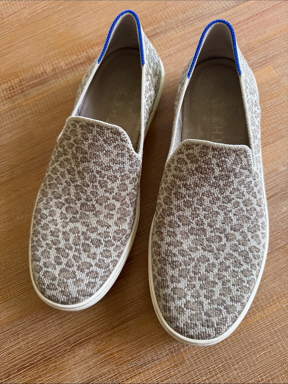 Rothy’s Cheetah Pebble Spot tan/brown knit upper slip on sneaker/shoe. Sz 7.5